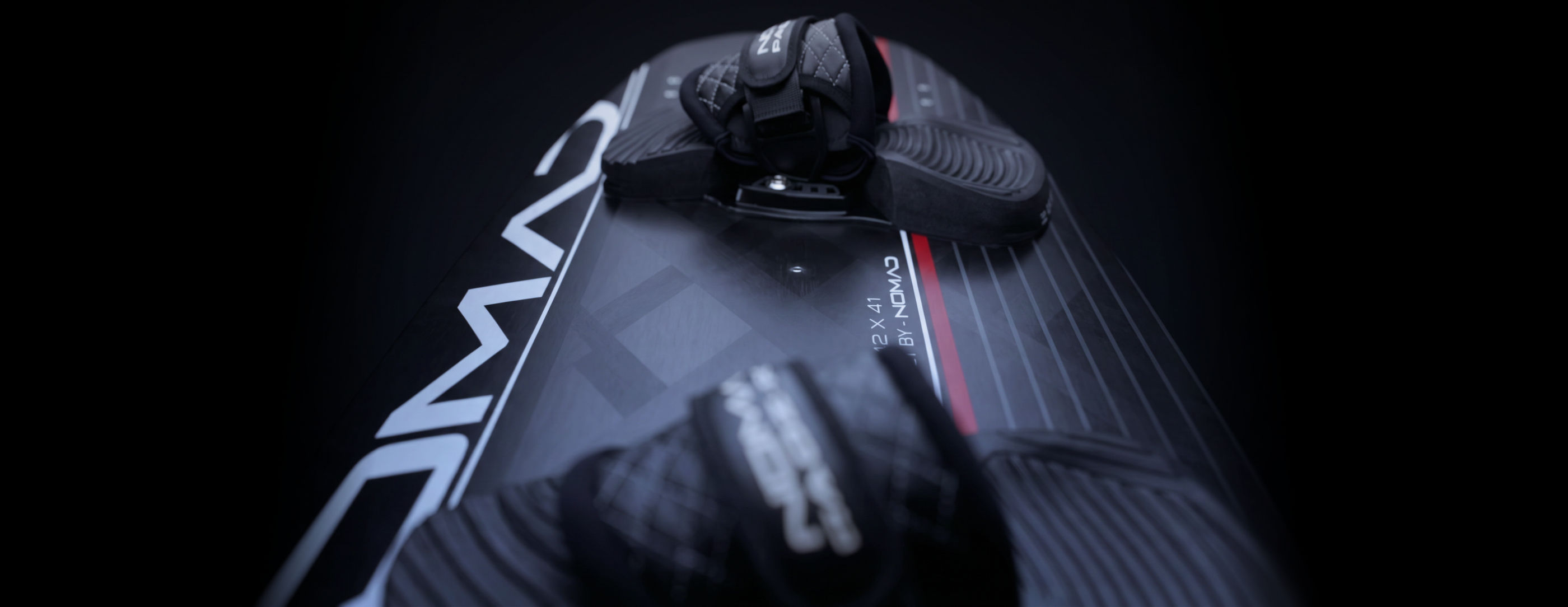Close-up of the Nomad Wave Twin-Tip deck and RS-2 bindings, 142x41 custom built by Nomad